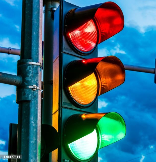 Traffic lights over urban intersection. Red light