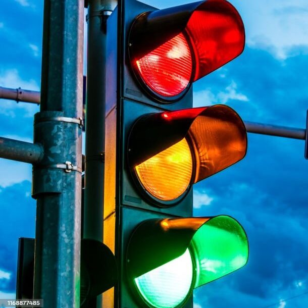 Traffic lights over urban intersection. Red light